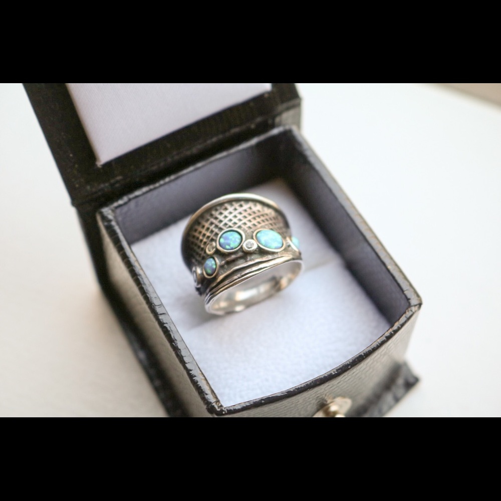 Opal and silver artisan ring
